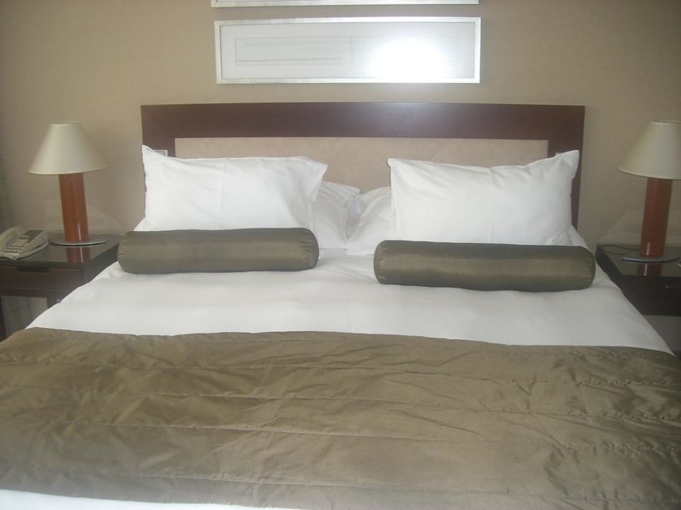 Bett im Standardzimmer  Grand Hotel Prague Towers