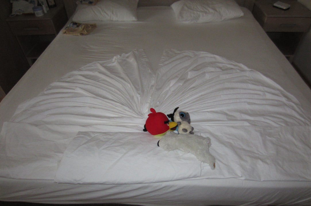 Schön gemachtes Bett Side Breeze Hotel