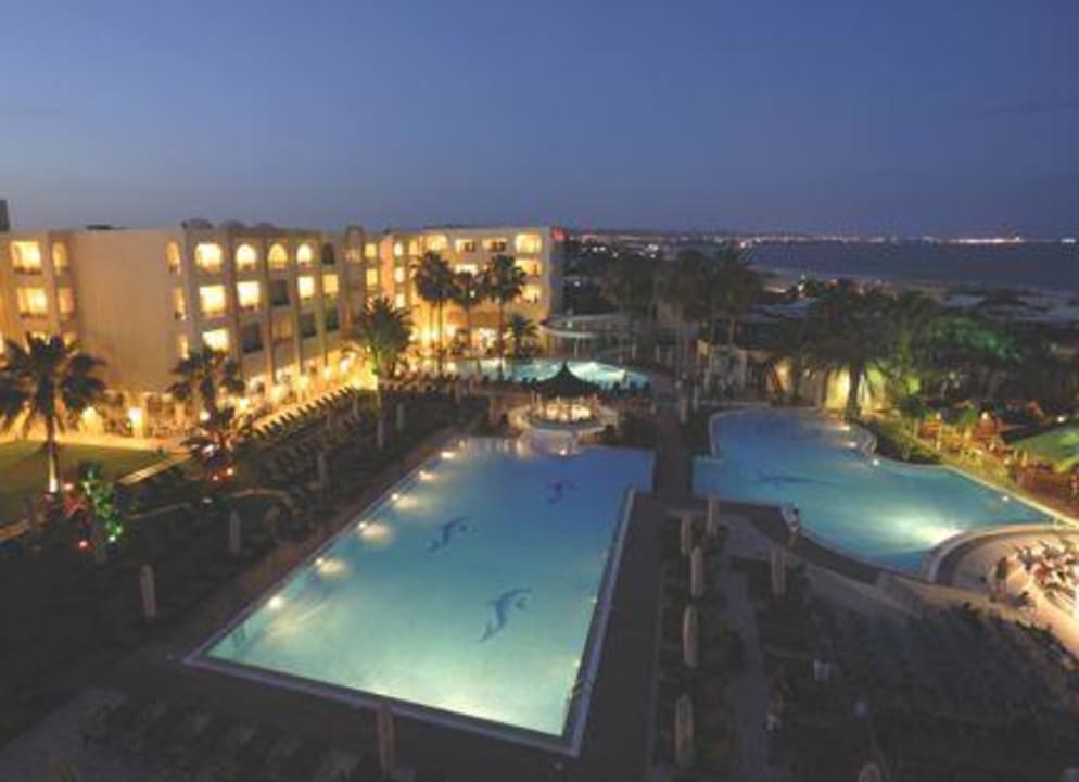 Swimming pools at night Hotel Paradis Palace