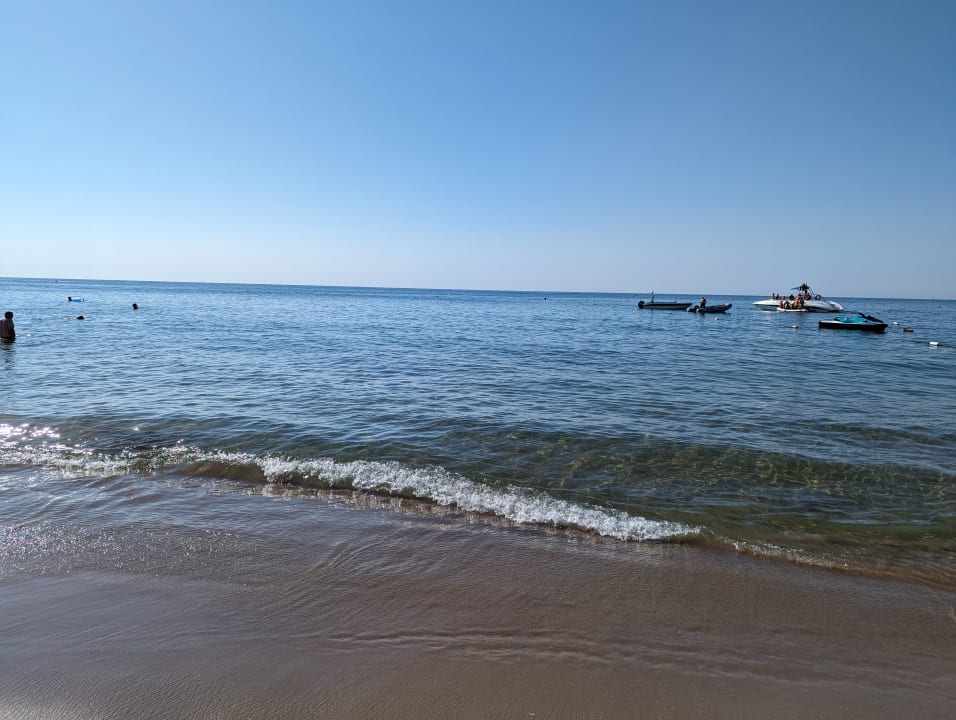 Strand Club Grand Side