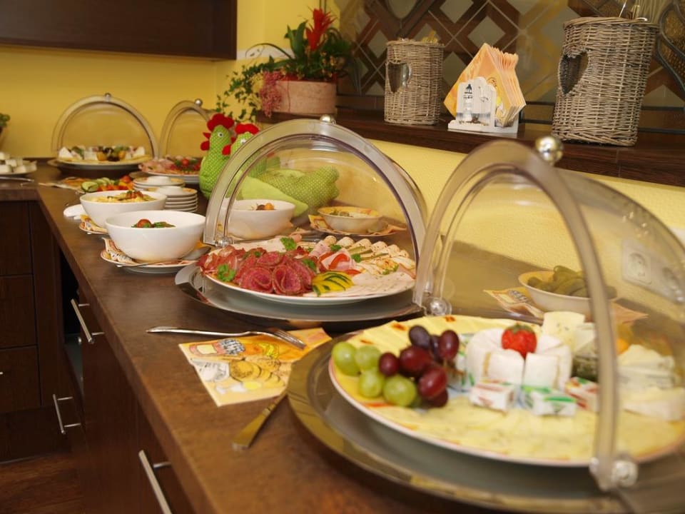 Buffet Aparthotel Strandhus Familie Herrgott