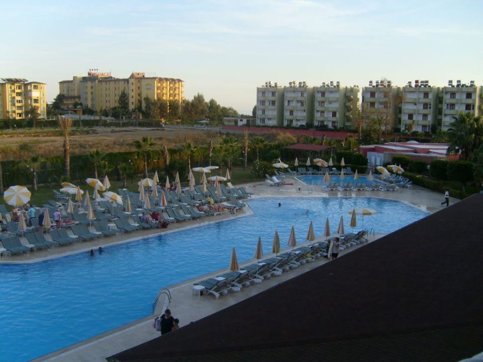 Pool Sonnenuntergang Hotel Royal Garden Beach
