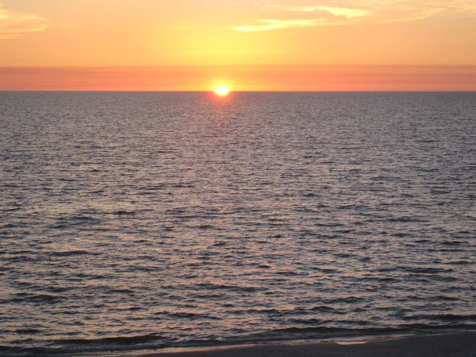 Sonnenuntergang Hotel Sandpiper Gulf Resort