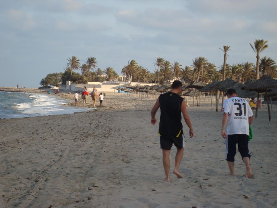 Spaziergang und Reiten am Strand Zita Beach Resort