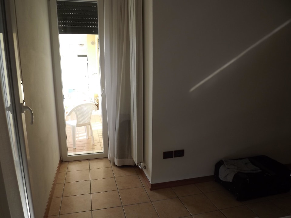 Elternschlafzimmer mit Balkonzugang Residence Le Farnie