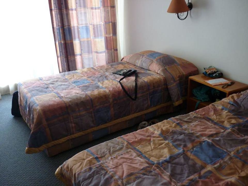 Een 2 en een 1 persoons bed Hotel Grand Efe