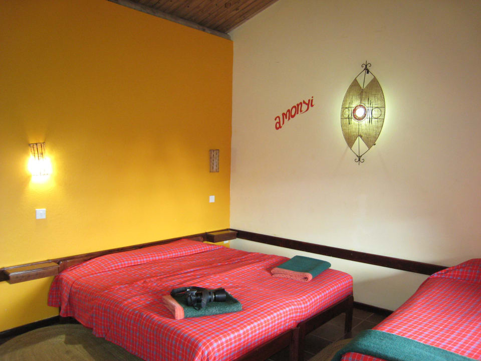 В номере было 2 кровати Rhino Lodge