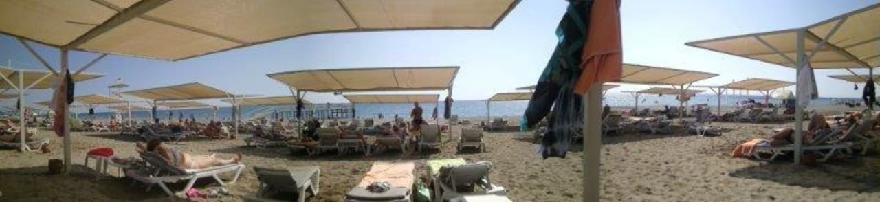 Stransrundblick Club Turtas Beach Hotel