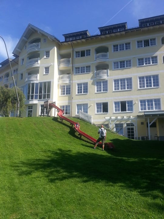 Rückansicht Nebengebäude mit Rutsche Dilly - Das Nationalpark Resort