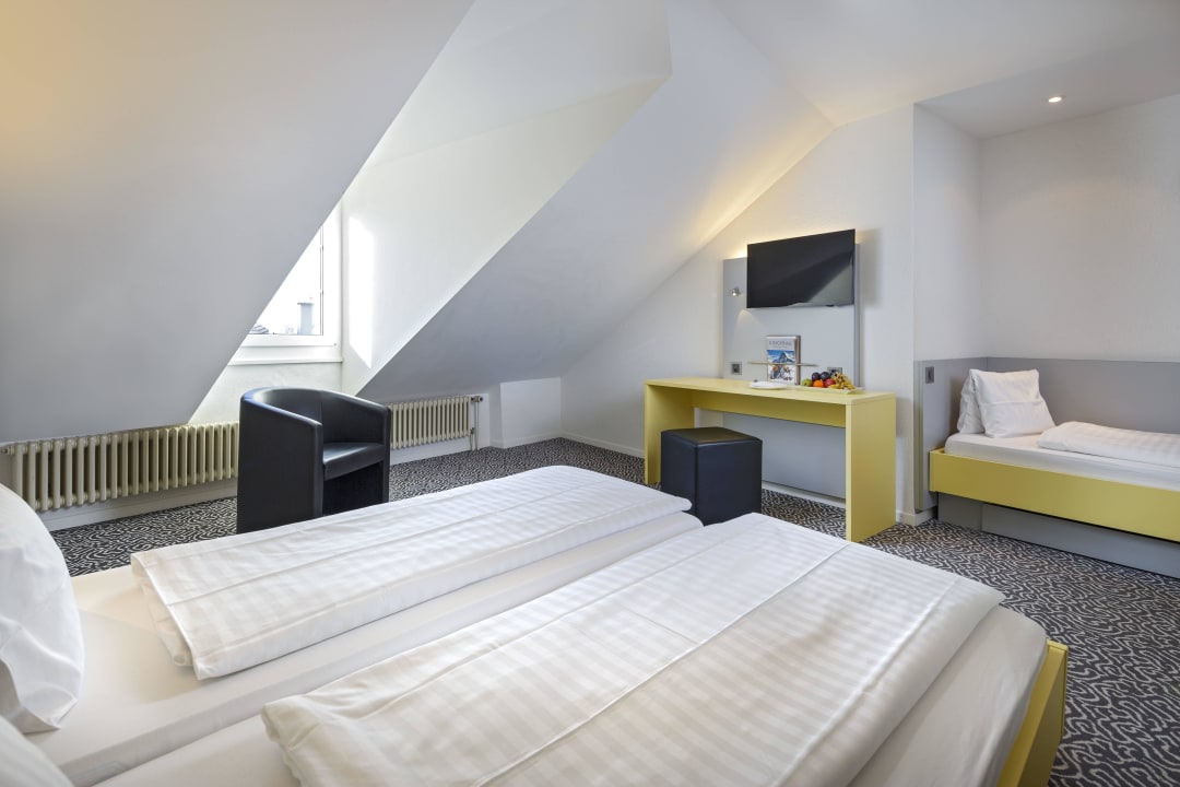 Standard Dreibettzimmer The HEY HOTEL