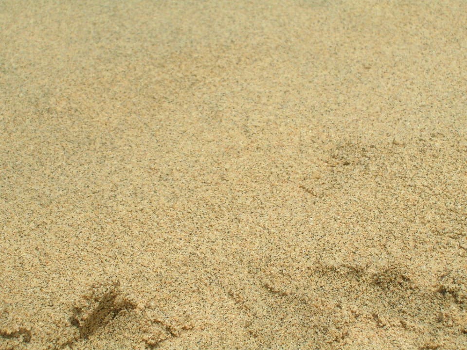 Strandsand vor dem Hotel SBH Club Paraiso Playa