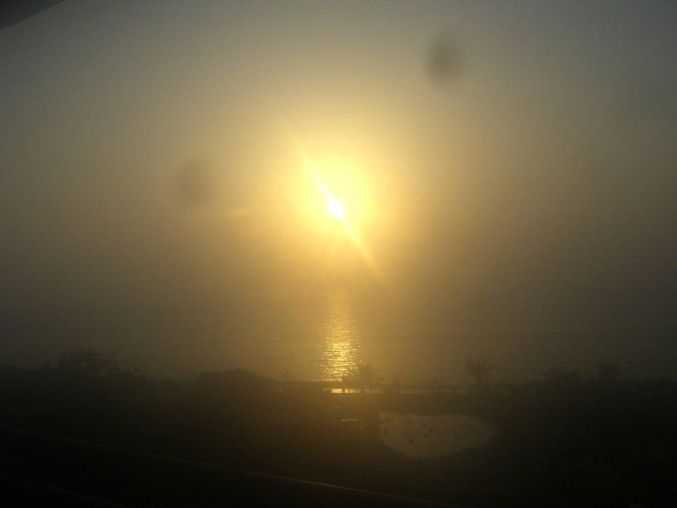 Sonnenaufgang überm Meer Hotel Le Meridien Al Aqah Beach Resort