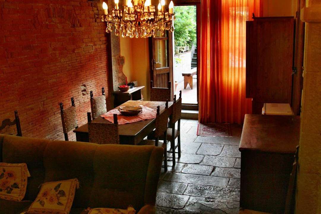 Wohn-, Esszimmer mit Kochnische Hotel Il Mulinaccio