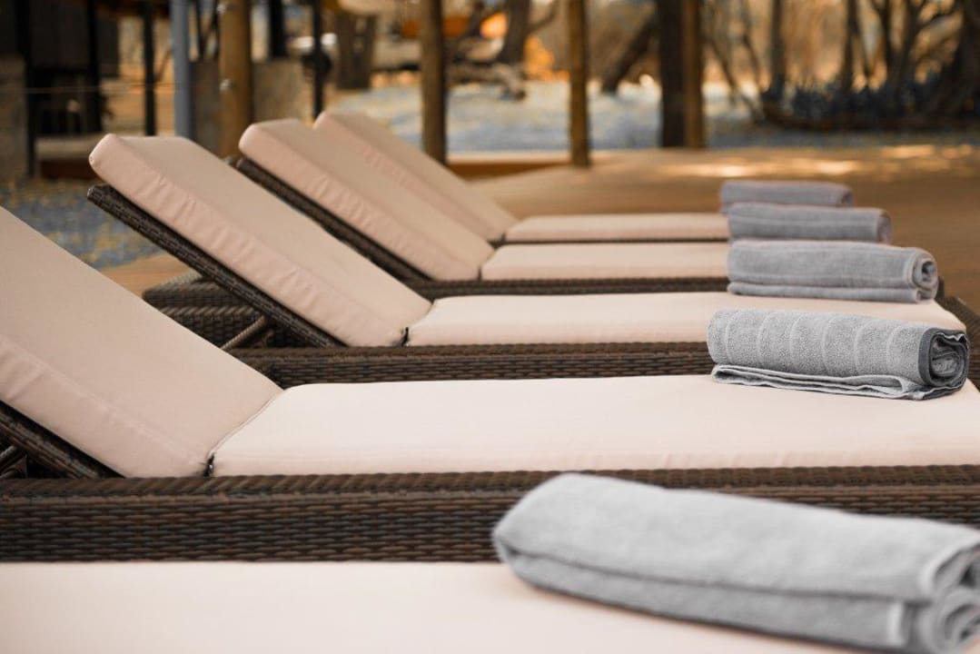 Relax by the Poolside Moditlo River Lodge