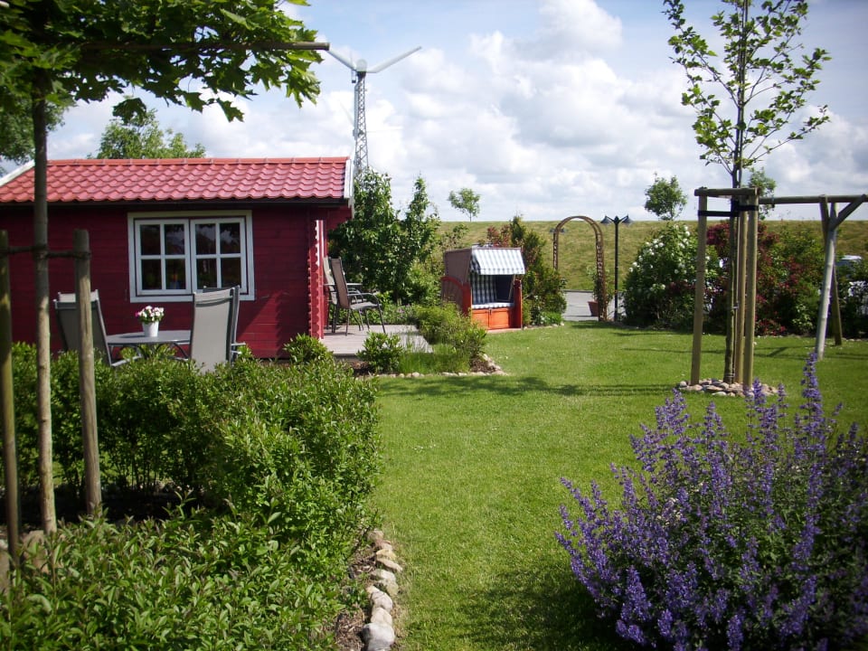 Ein schöner Garten zum Entspannen Hotel Pension Strandkorb