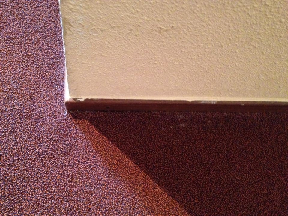 Fleckiger Teppich Hotel de Witte Bergen