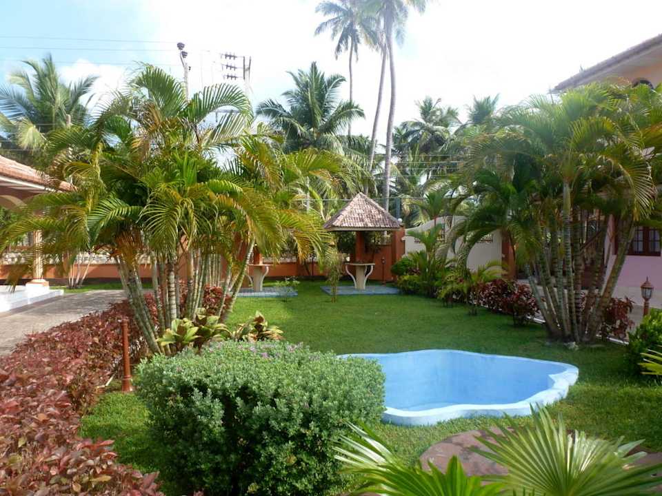 Zwischen einigen Bungalows Paradise Holiday Village