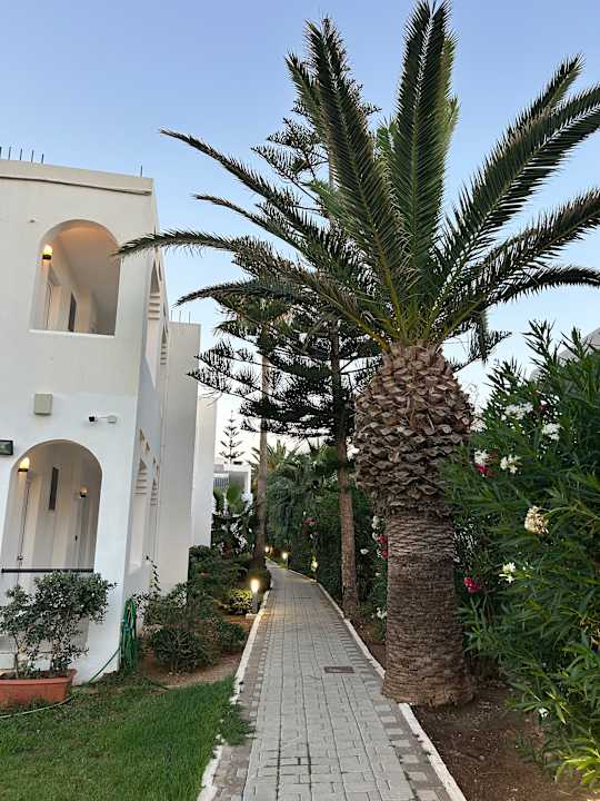 Gartenanlage HARPIN Happy Days Beach Hotel