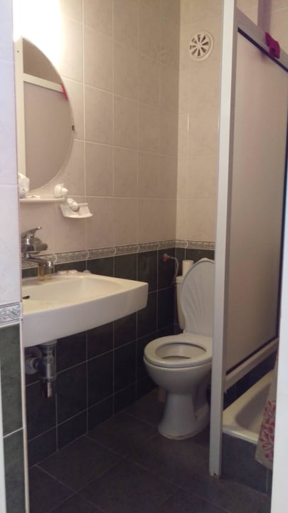 Bad mit Toilette Hotel Perla Plaza