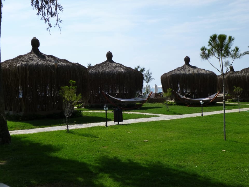 Pavillions laden zum ausruhen ein Crystal Tat Beach
