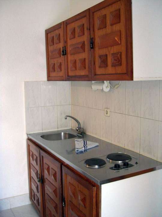 Die Küche im Bungalow HL Miraflor Suites Hotel