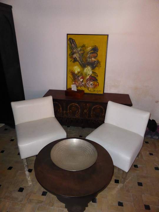 Table and chairs in bedroom Riad Layla