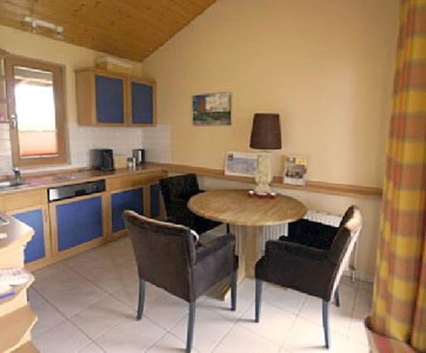 Küche mit Spülmaschine und Essbereich Feriendorf Sehestedt