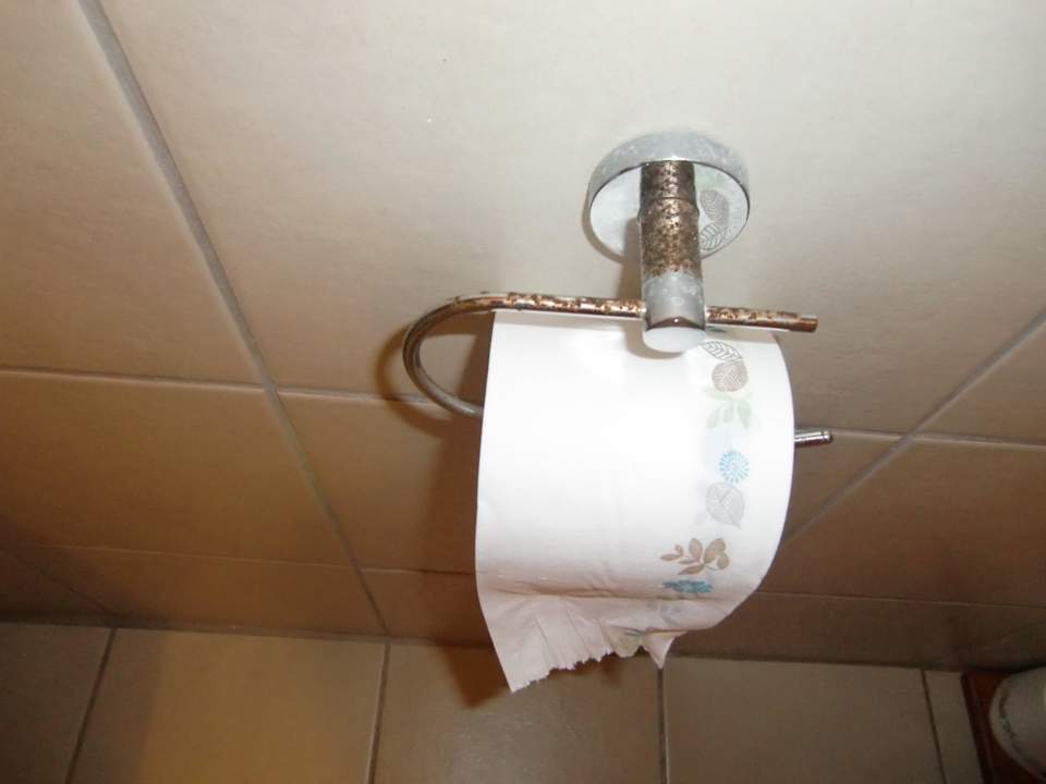 Verrosteter Papierhalter Guest House Sea Paradise