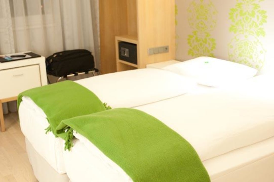 Das Bett im Doppelzimmer NH Ludwigsburg