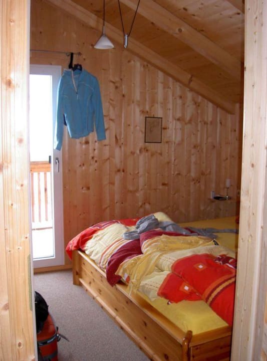 Schlafzimmer mit Doppelbett Alpendorf Dachstein West by ALPS RESORTS