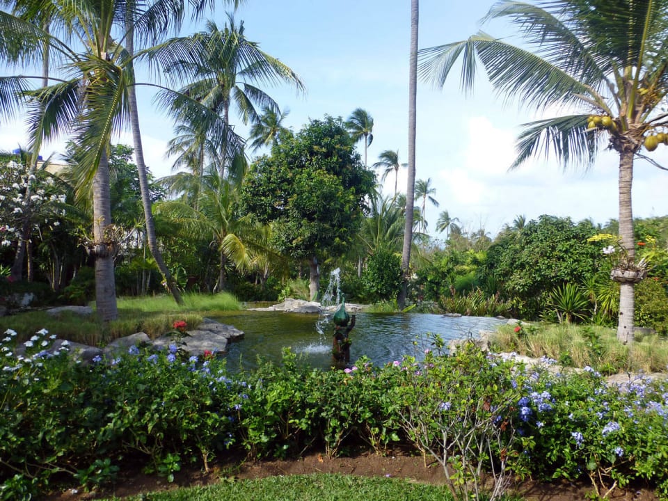 Schön gestalteter Garten Melati Beach Resort & Spa