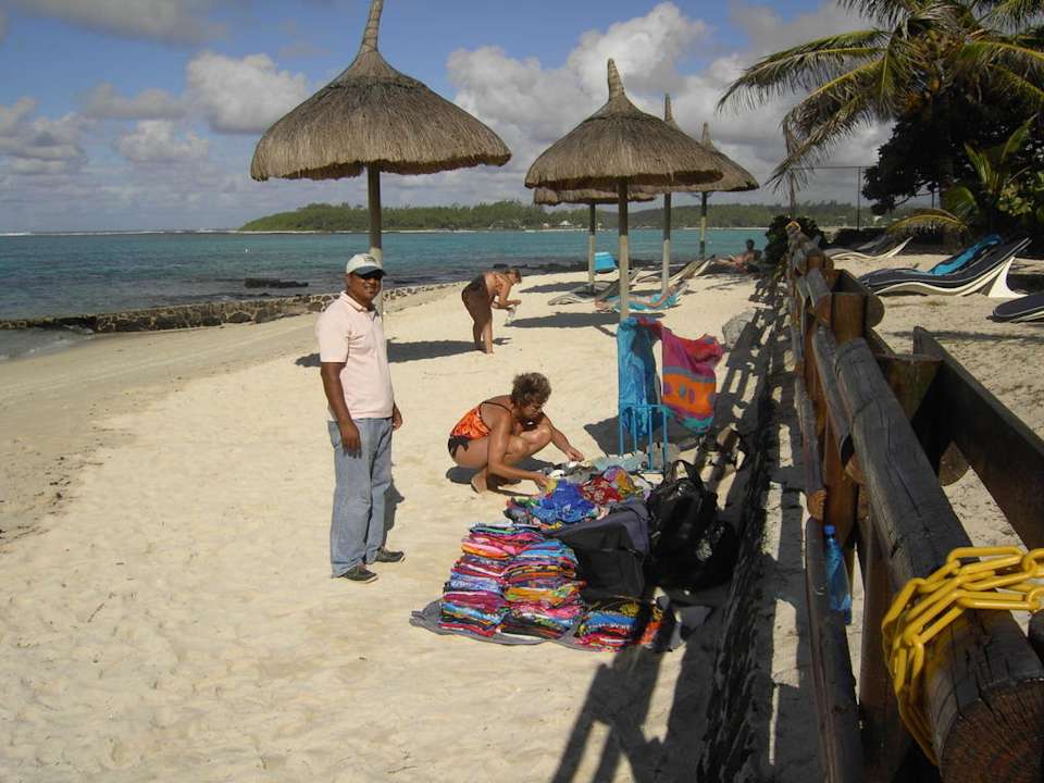 Strandverkäufer Le Peninsula Bay Beach Resort & Spa