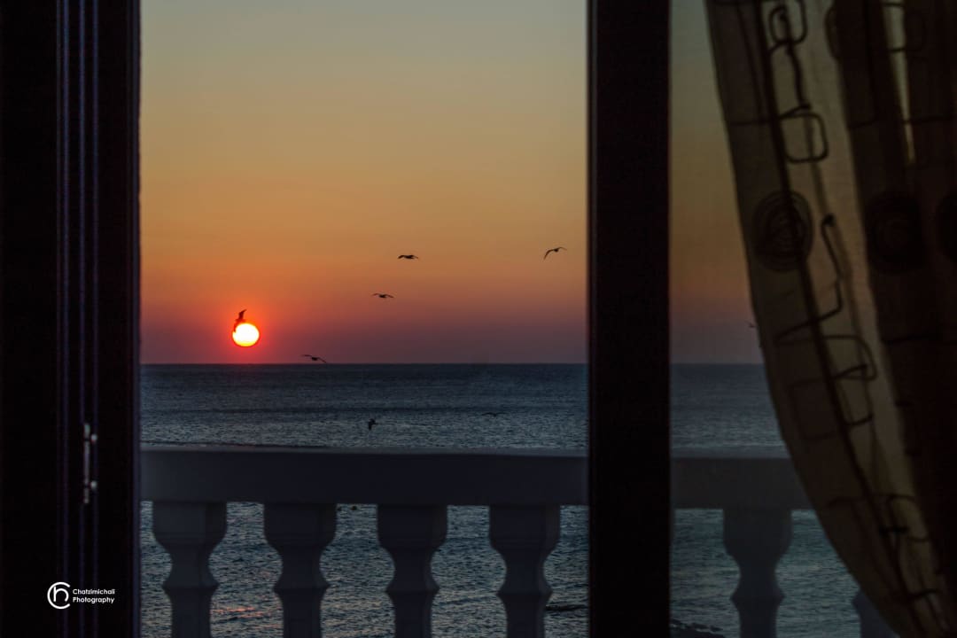 Sea view sunset George Apartments Stegna