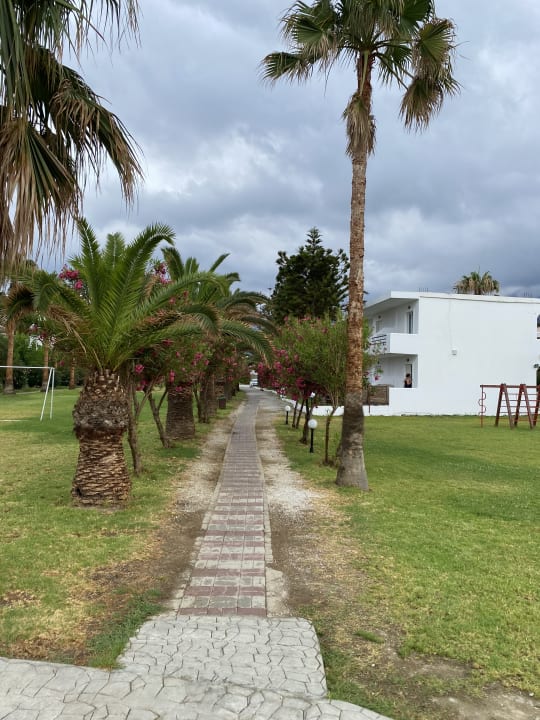 Gartenanlage HARPIN Happy Days Beach Hotel