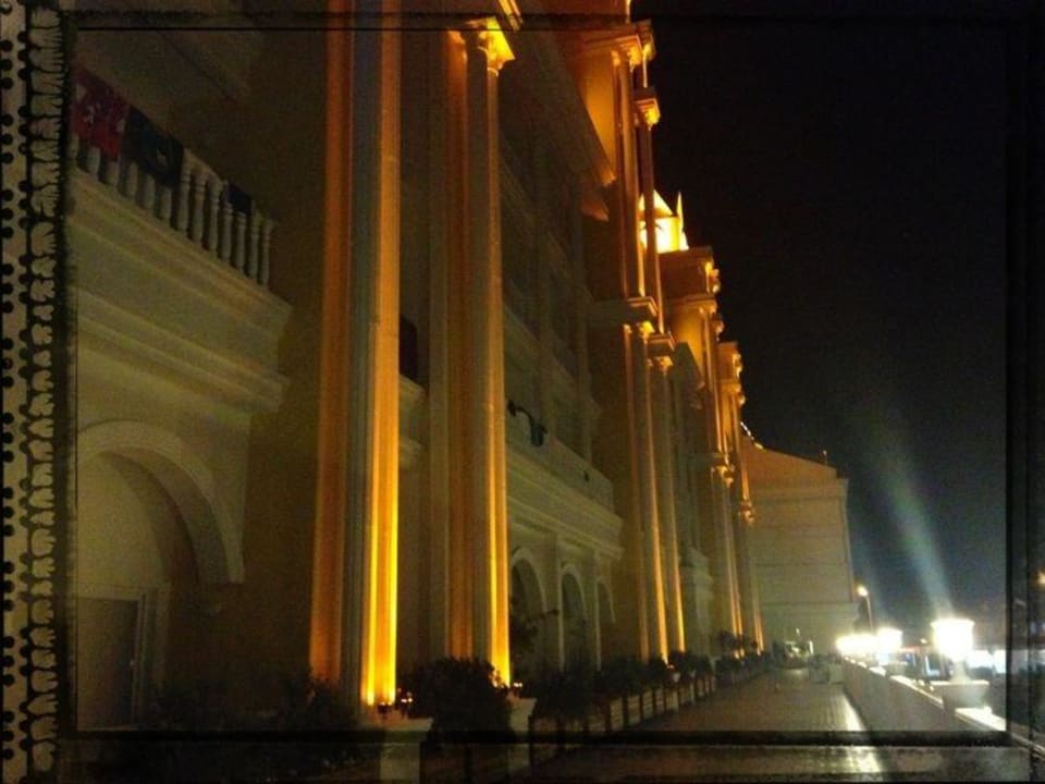 Nightime view of external seating areas Dream World Resort & Spa