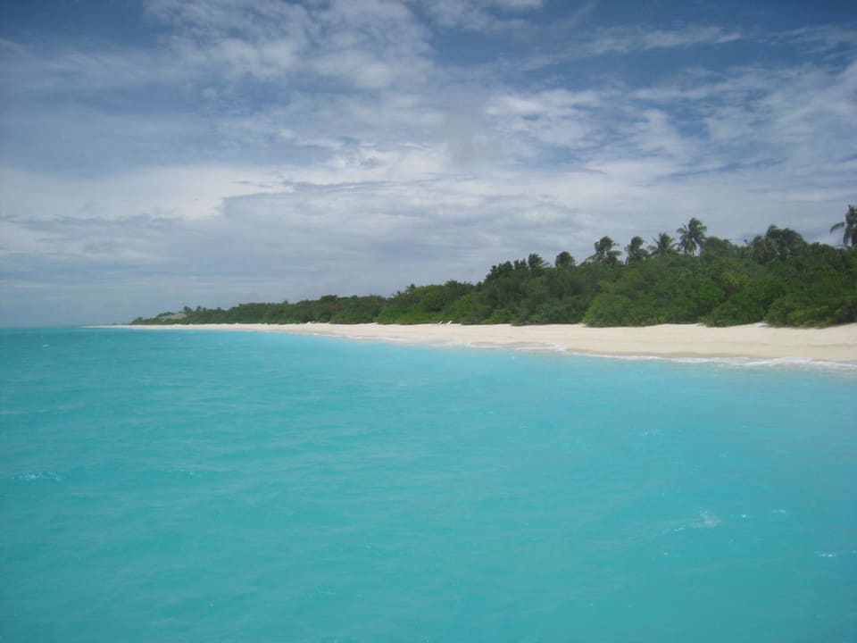 Strand auf der Sonnenuntergangsseite Palm Beach Resort & Spa Maldives