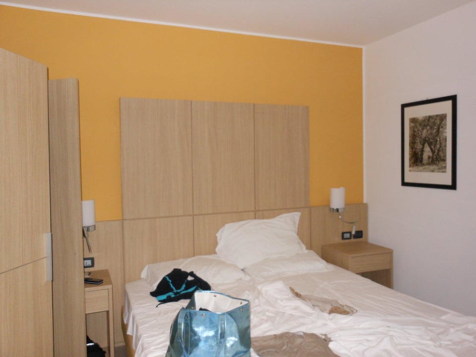 Schlafzimmer Aregai Marina Hotel & Residence