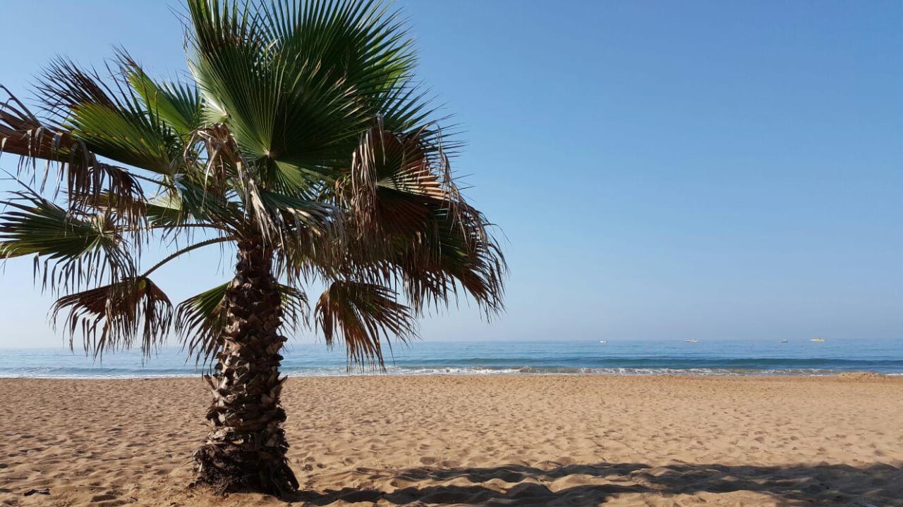 Strand Club Grand Side