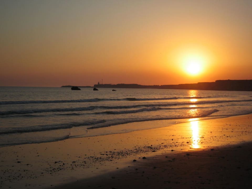 Sonnenuntergang am Strand Hipotels Flamenco Conil