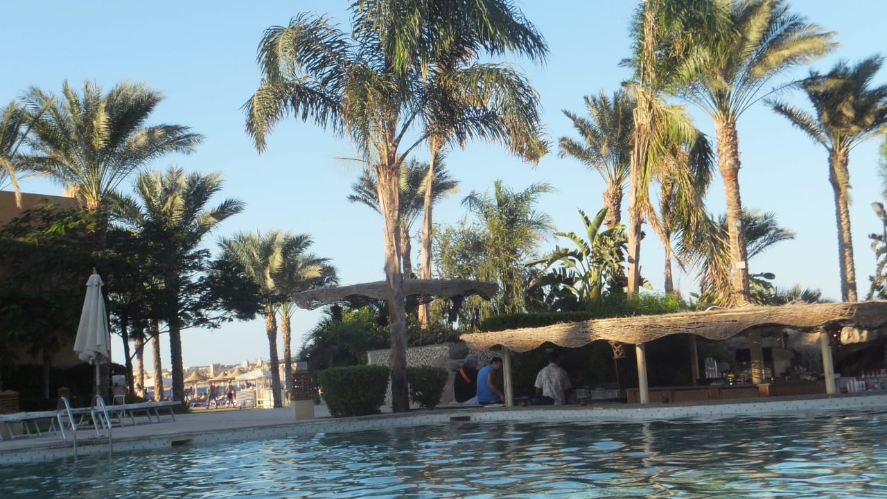 Pool bei Sonnenuntergang Stella Beach Resort & Spa Makadi Bay