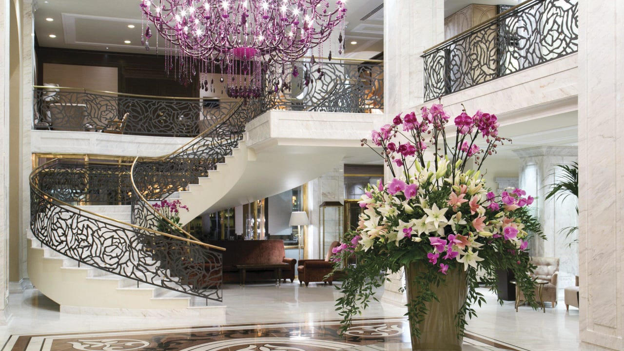 Lobby view with big spiral staircase Hotel Baltschug Kempinski Moscow