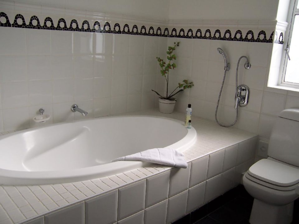 Bad mit Badewanne Romney Park All Suite Hotel & Spa