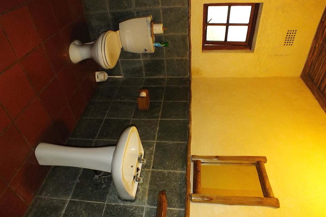 Großes Badezimmer Hotel Drifters Hazyview Inn