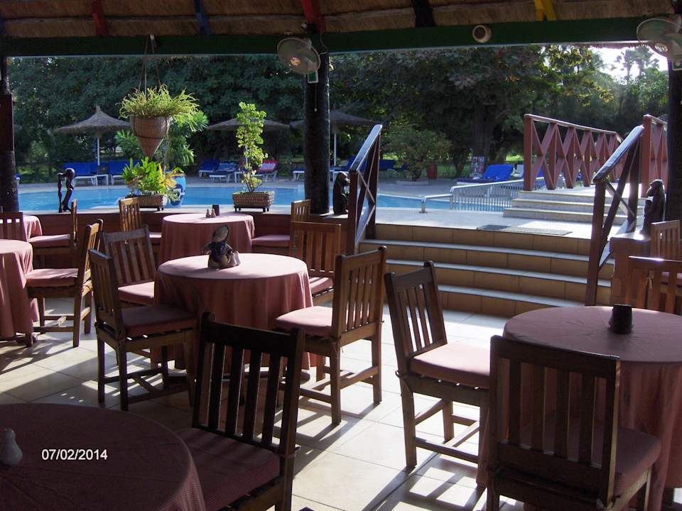 Seating area in pool bar The Kairaba Beach Hotel