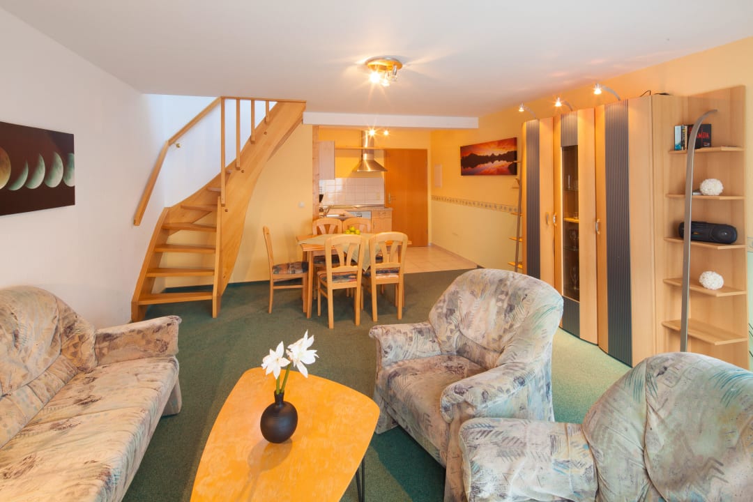 Wohnzimmer Moin! Apartments Haus am Mühlenpark