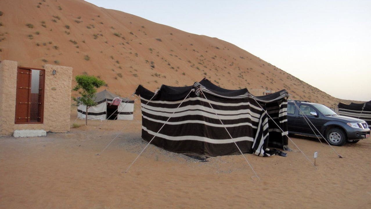 Tent and car Desert Retreat Camp