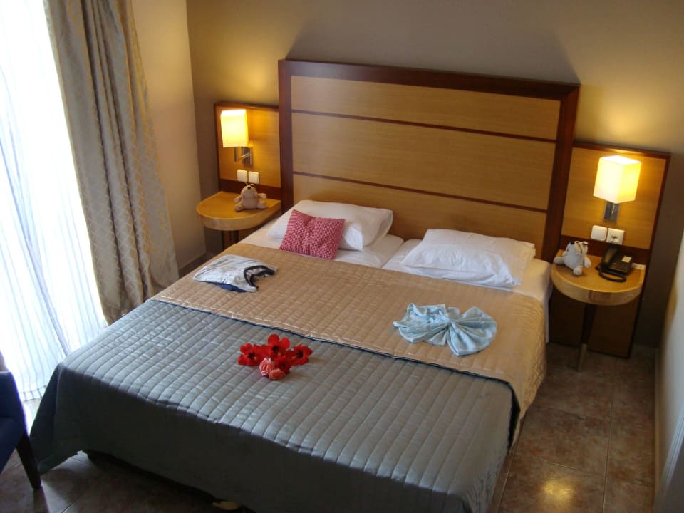 Schlafraum Athina Palace Resort & Spa
