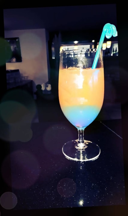 Ich bat den Barmann etwas "farbiges" zu machen Starlight Resort Hotel