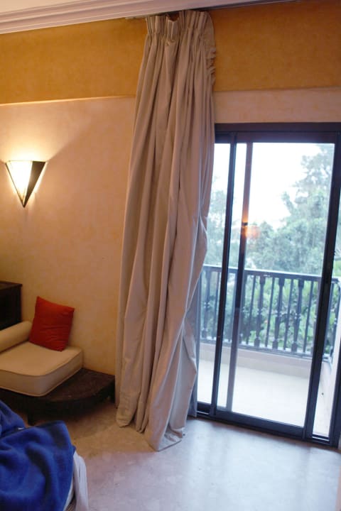 Herunterhängende Gardinen Oasis Hotel & Spa