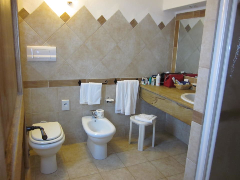 Badezimmer Park Hotel Cala di Lepre & Spa